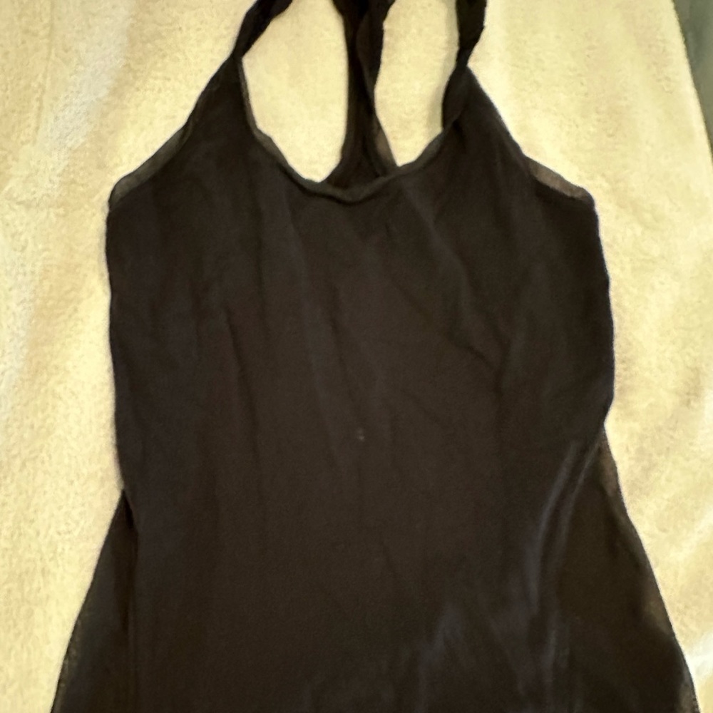 Lululemon black tank. With mesh and ruching up the back. Size 6